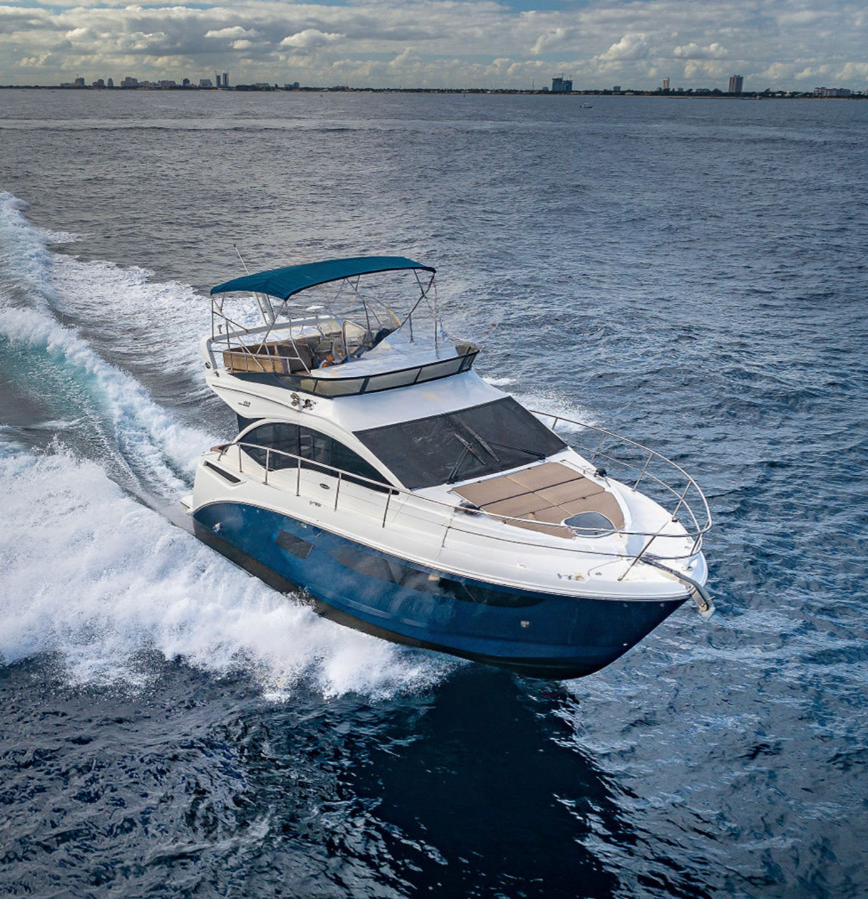 Aerial view of Blue Me Away yacht in turquoise water